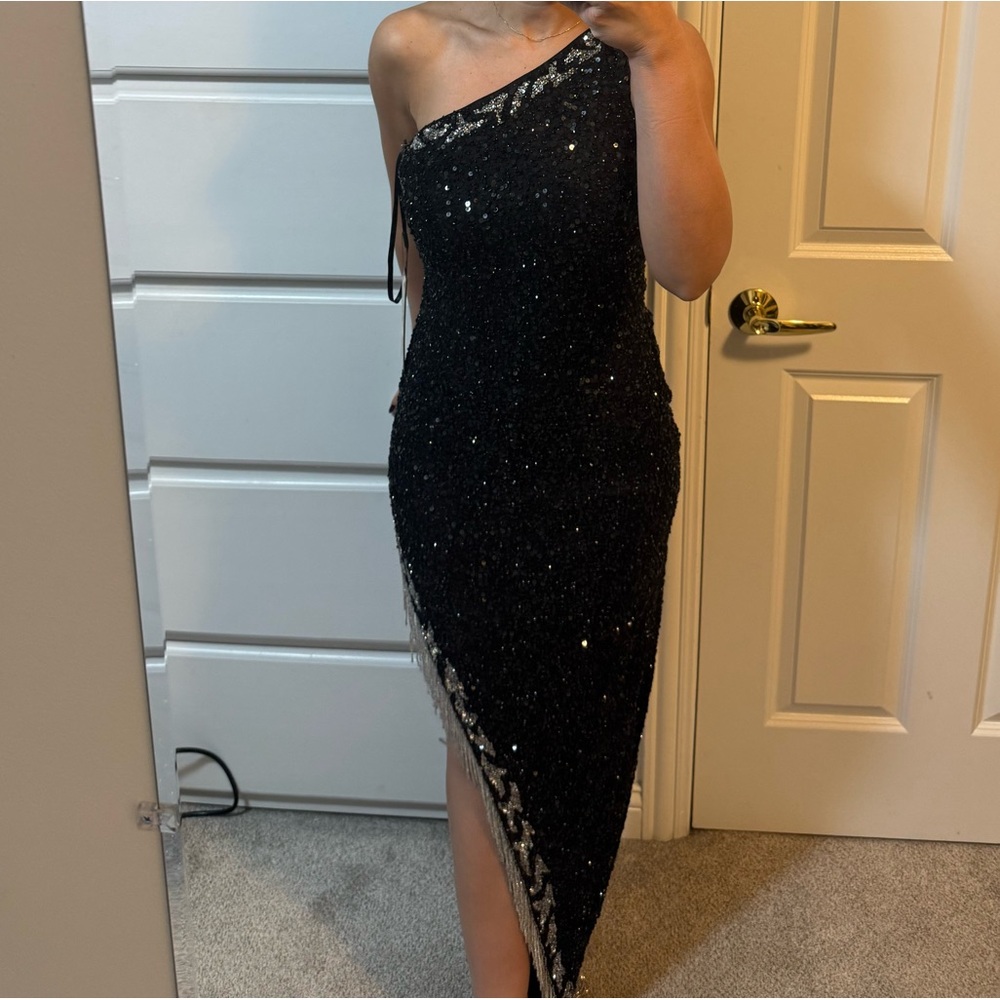 Black and silver high side slit beaded and sequin gown . size us 4 brand new .